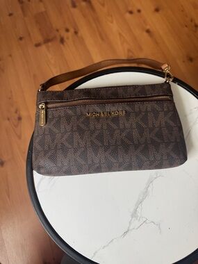 Michael Kors Brown Monogram Logo Wristlet with Gold Hardware